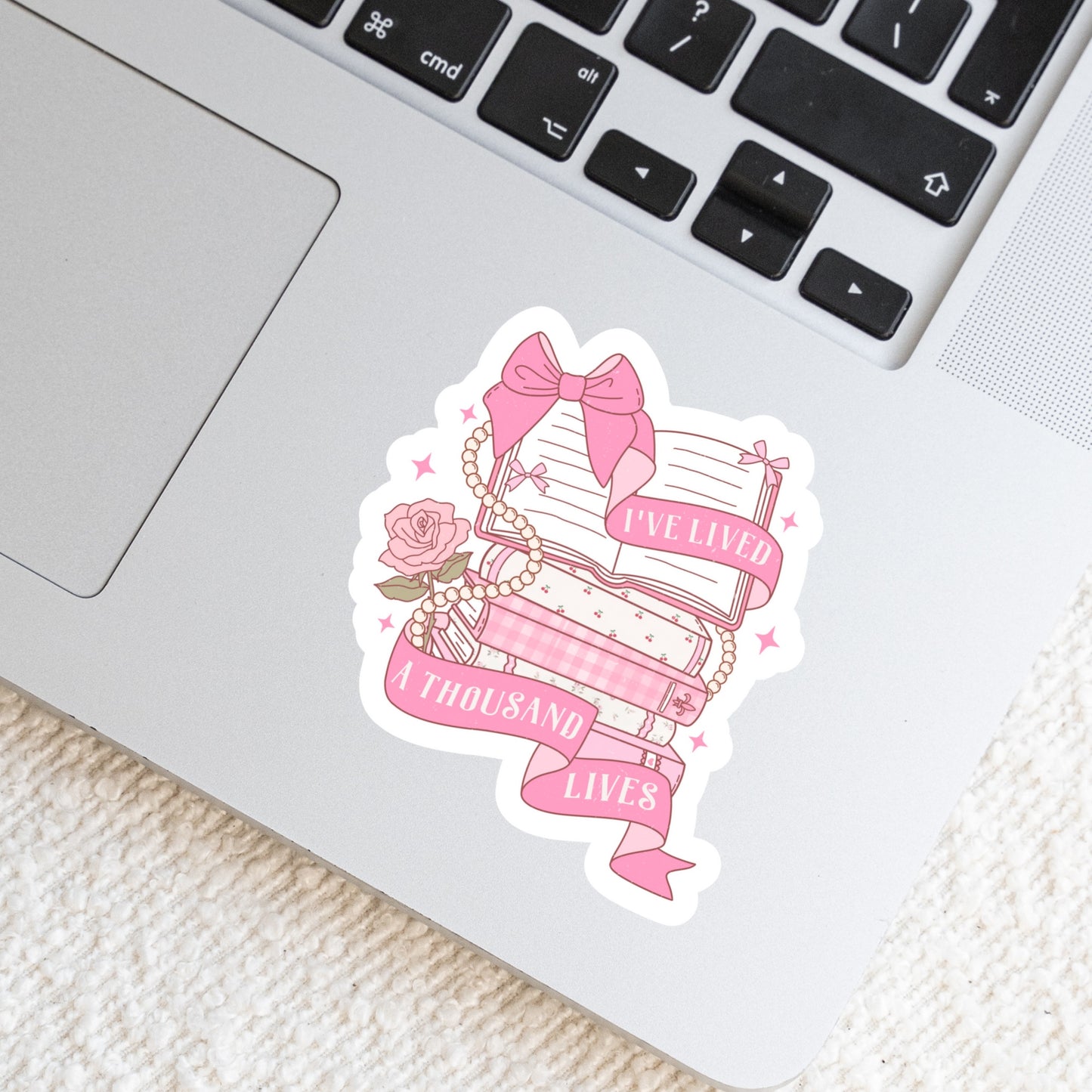 I've Lived a Thousand Lives Pink Girlie Coquette Book Reader Sticker โ 3" Waterproof Bookish Sticker with Holo Overlay โ Reading, Books, Reader Gift, Book Lover, Bookstore Merch