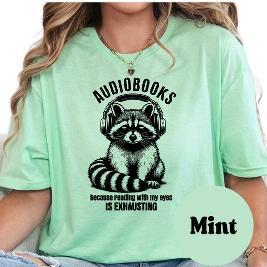 Audiobooks Are Exhausting Shirt – Funny Bookish Raccoon Tee – Audiobook Lover Shirt – Lazy Reader Gift – Bookworm Introvert Graphic Tee