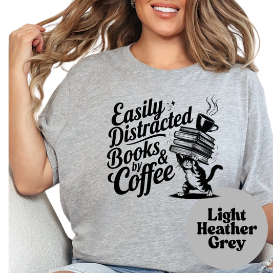 Easily Distracted by Books and Coffee Shirt – Funny Cat Book Lover Tee – Caffeine & Fiction Graphic Shirt – Gift for Readers and Coffee Addicts