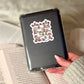 Reading Ghosts Chrostmas Book Reader Sticker – 3" Waterproof Bookish Sticker with Holo Overlay – Reading, Books, Reader Gift, Book Lover, Bookstore Merch