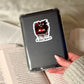 Powered by Magic and Dark Stories Book Reader Sticker – 3" Waterproof Bookish Sticker with Holo Overlay – Reading, Books, Book Lover